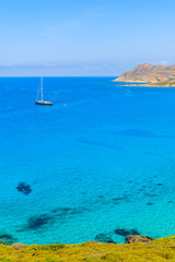 A yacht boat on in Ostriconi sea bay, Corsica island, France