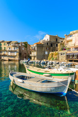 Fototapeta na wymiar Fishing boats in Erbalunga port on Cap Corse, Corsica island, France