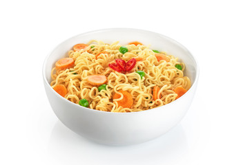 Bowl of instant noodles with peas, carrots and chili, isolated o