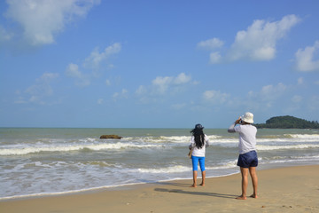 Fototapeta na wymiar Two women on the beach