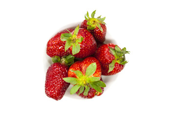Fresh strawberries on a plate on white background