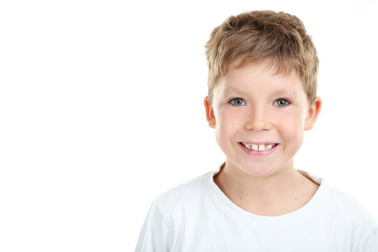 Portrait of happy little boy on white background