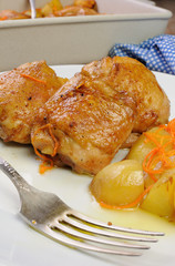 Pieces of chicken with potatoes