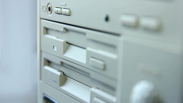 Inserting Diskette Into Retro Computer Timelapse