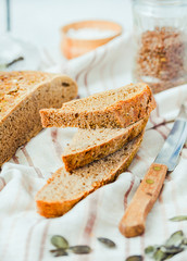 homemade rye bread unleavened with seeds, slices, selective focu