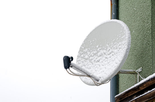 Satellite dish, television antenna in the winter