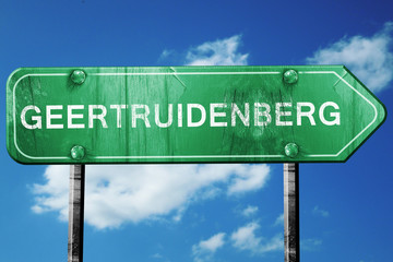 Geertruidenberg road sign, vintage green with clouds background