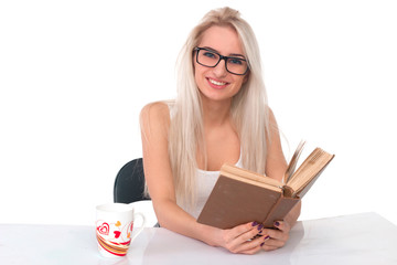 Woman with cup and book