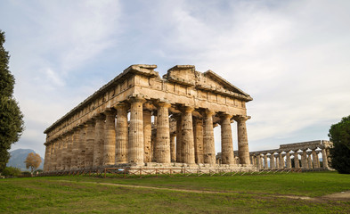 Fototapeta na wymiar Greek Temples of Paestum - UNESCO World Heritage Site, with some of the most well-preserved ancient Greek temples in the world. It's about three temples of Hera, Poseidon and Ceres in Paestum ,Italy.