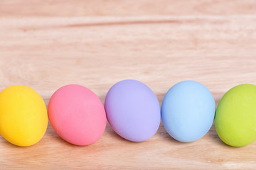 Easter eggs on wood floor