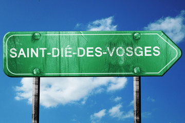 saint-die-des-vosges road sign, vintage green with clouds backg
