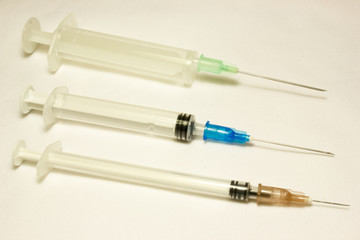 Fototapeta premium Plastic disposable syringe on white background.