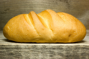 Baguette bread on wooden background