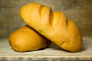 Baguette bread on wooden background