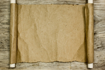 Sheet of parchment on wooden table