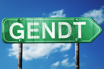 Gendt road sign, vintage green with clouds background