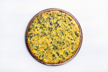 Omelette with herbs, cheese and zucchini