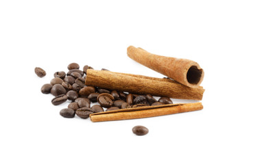 coffee beans and cinnamon sticks isolated on white background