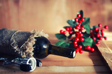 toned wine glass wooden background