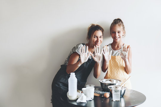 Mom baking with her daughter