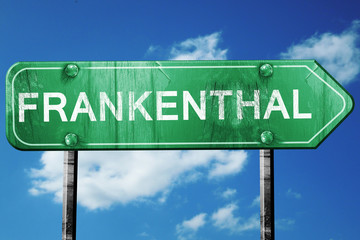 Frankenthal road sign, vintage green with clouds background