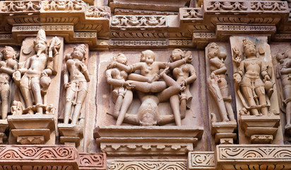 Bas-relief at famous ancient temple in Khajuraho, India