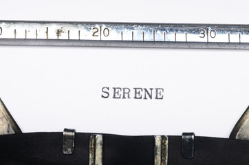 Word serene typed on typewriter