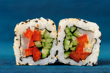 Japanese sushi rolls with tuna and fresh vegetables wrapped