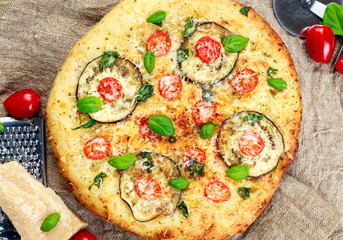 Pizza eggplant with tomatoes and Basil.