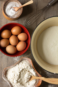 flour, eggs, whisk in a cup of kefir and for the preparation of dough. view from above close-up