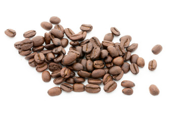 Coffee grains and leaves isolated on the white backgrounds.