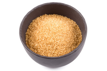 brown sugar in a dark bowl