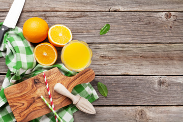 Fresh ripe oranges and juice