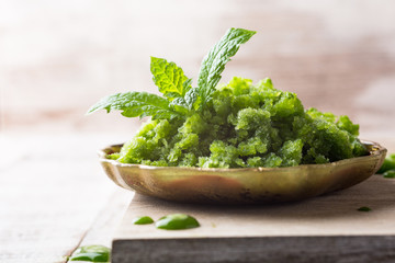 Sorrel granita in metal spoon. 