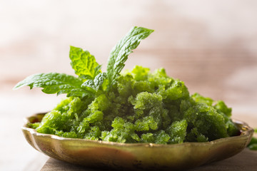 Sorrel granita in metal spoon. 