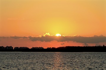 Golden sunrise lights from Rickenbacker bay, miami florida