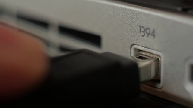 FireWire connector on the laptop.