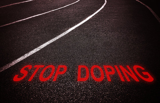 Stop doping concept. Text on running track
