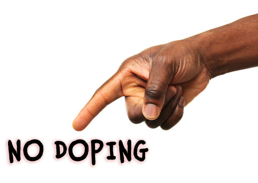 Stop doping concept. Human hand pointing on text isolated on white