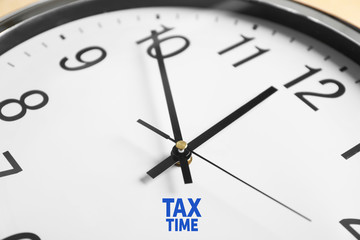Tax Concept. Clock face closeup
