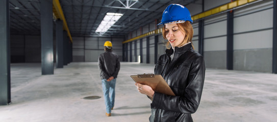 Site Inspector making notes