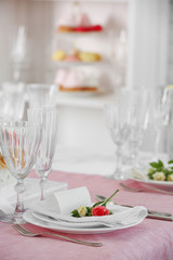 Beautiful served table for wedding or other celebration in restaurant
