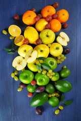 Fruits on dark blue wooden background