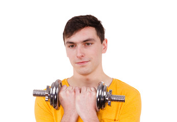 Fototapeta na wymiar Man exercising with dumbbells lifting weights
