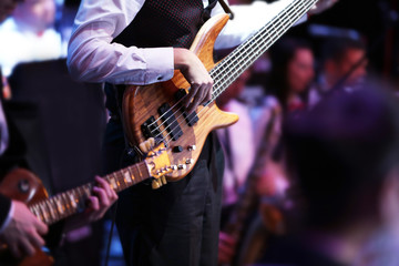 Guitarist playing the guitar at concert