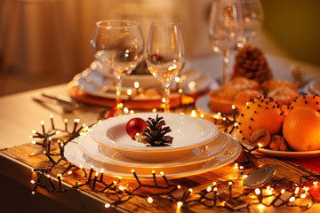 Christmas table setting with holiday decorations