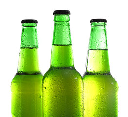 Bottles with fresh beer isolated on white