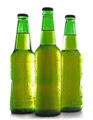 Bottles with fresh beer isolated on white