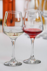 Wine glasses with red and white wine, closeup