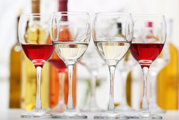 Wine glasses with red and white wine, closeup
